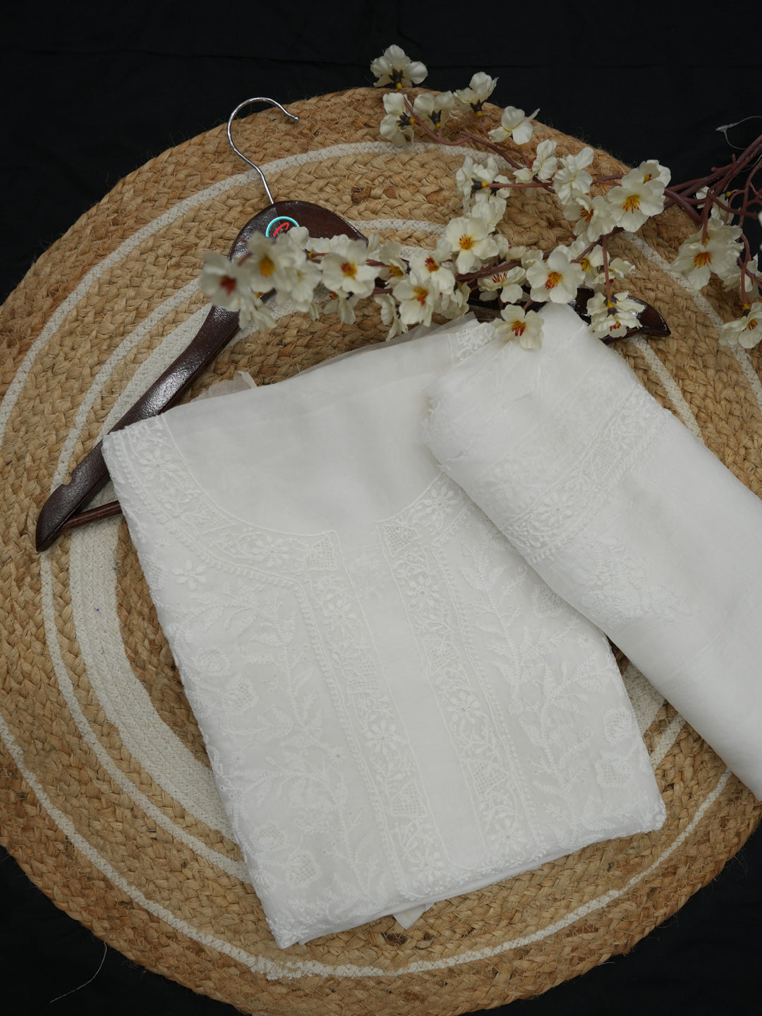 Hand embroidered white muslin Lucknowi chikankari showing bakhiya shadow work and jaali stitch detail
